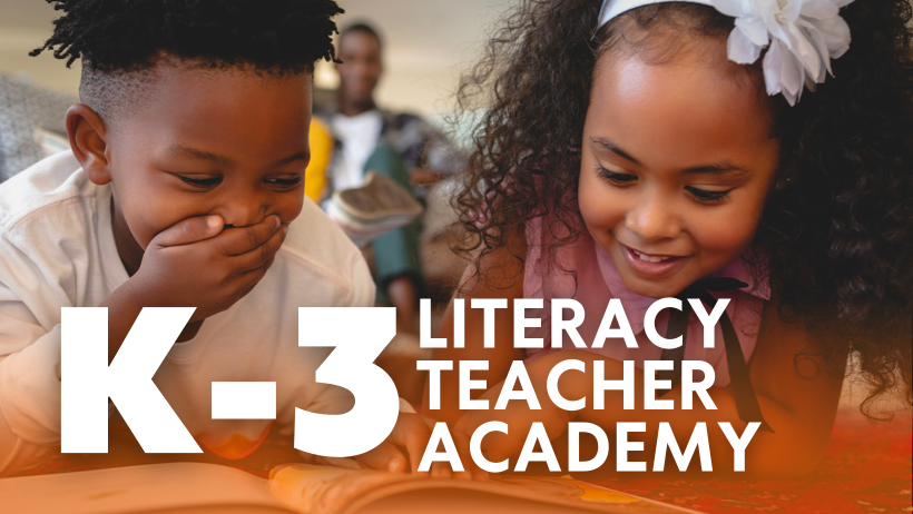 K-3 Literacy Teacher Academy: two young students laughing over a book